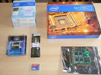 CPU, motherboard, quad Ethernet adapter, Compact Flash card, RAM, and IDE-to-CF adapter.